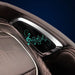 Chrome headrest speaker of the Infinity Palisade 4D Max Massage Recliner with music notes showing Bluetooth audio
