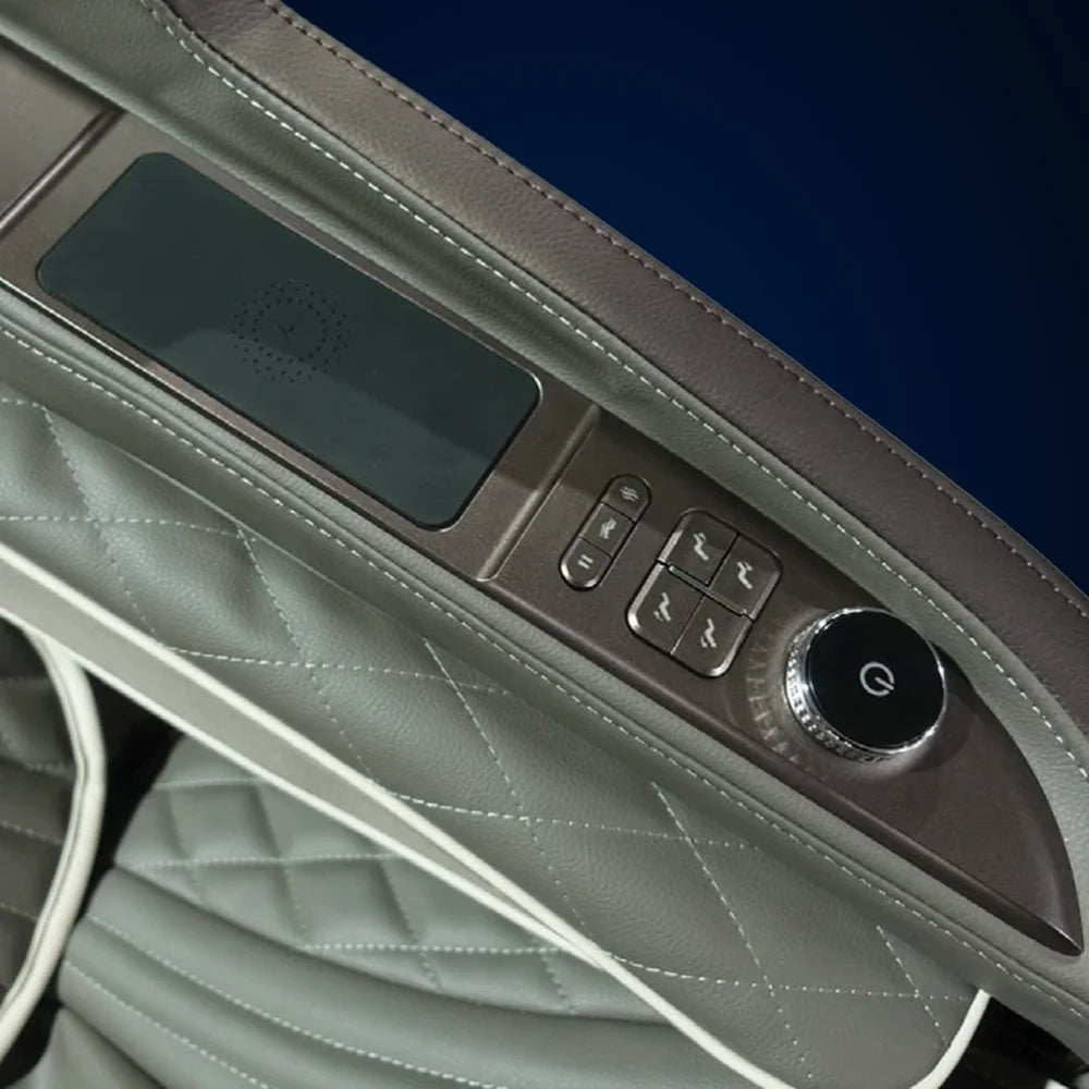 Close-up of the smart dial, recline buttons and wireless charging pad on the Infinity Sensation 4D DualFlex arm panel