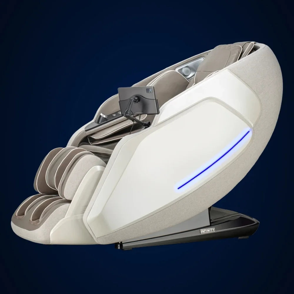 Glowing blue chromotherapy light strip along the cream shell of the Infinity Serenza Flex 4D on a dark backdrop