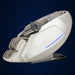 Glowing blue chromotherapy light strip along the cream shell of the Infinity Serenza Flex 4D on a dark backdrop