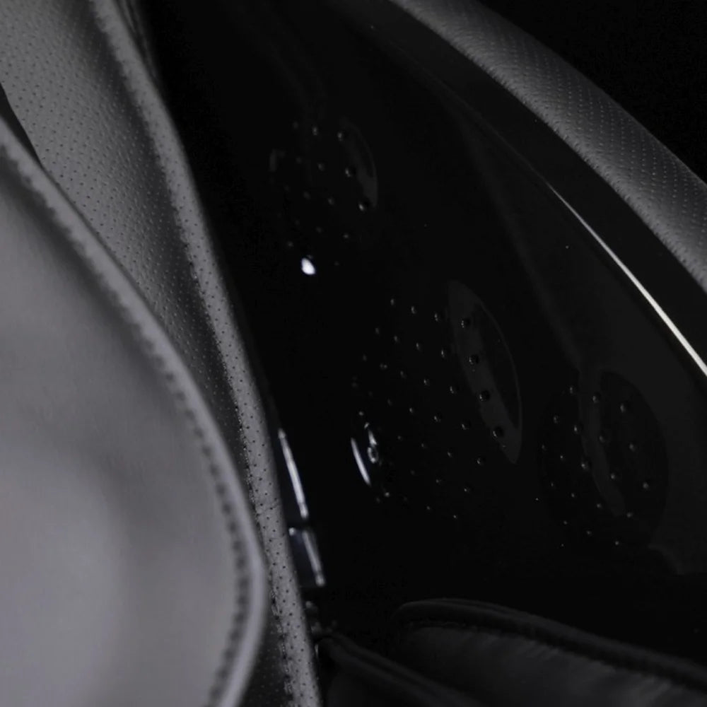 Perforated headrest speaker grille detail on the Infinity Smart Chair X3 Zero Gravity Massage Chair in black