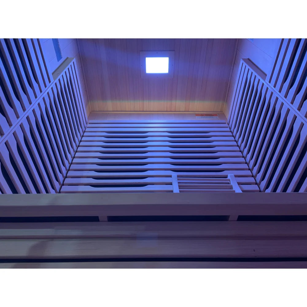 Ceiling LED light, backrest and side heater walls seen inside the Blisspod Milano Indoor Sauna cabin