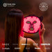 Woman holding the glowing Lumara VISO Mask with FSA HSA eligibility badge and magazine press logos