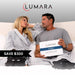 Couple in bed with a Lumara VISO Red Light Therapy Mask box and two masks in a save $300 promo
