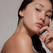 Young woman with highly hydrated luminous skin, the look associated with the Galaxy Zero Atlas Body Wellness Device