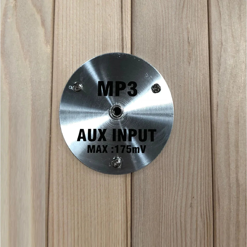 Brushed metal MP3 aux input jack plate on the hemlock wall of the Maxxus Bellevue 3 Person Infrared Sauna