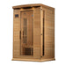 Angled hemlock cabin view of the Maxxus MX-K206-01 2 Person Sauna with side window, glass door and roof lights on