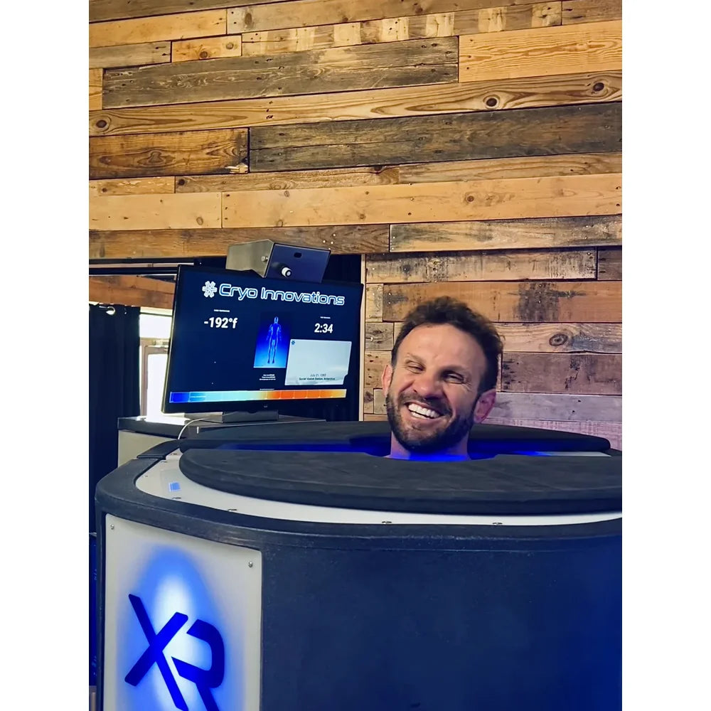 Man mid-session in the Cryo Innovations XR with monitor showing -192°f cabin temperature and 2:34 remaining