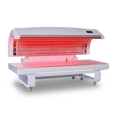 Front angled studio photo of the Nextgen Fit Light Therapy Bed open with the full red LED array illuminated