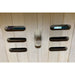 Open slotted wall vent with turned wooden knob inside the Blisspod Bergen Deluxe Sauna hemlock cabin
