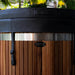 Ora Ice Bath red cedar cold plunge tub with its black cover fitted on top