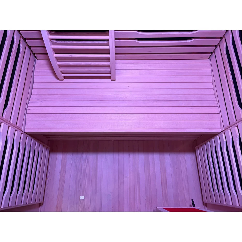 Looking down at the hemlock bench and floor inside the Blisspod Milano Indoor Sauna cabin