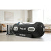 Black OxyRevo Apex36 1.5ATA Chamber beside the all-in-one Pro Kit machine cabinet in a living room