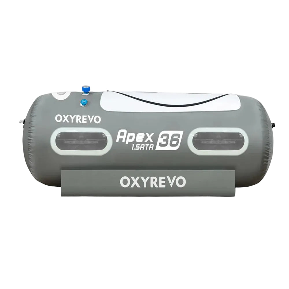 Straight-on studio elevation of the OxyRevo Apex36 Oxygen Chamber with two tinted windows and top valves