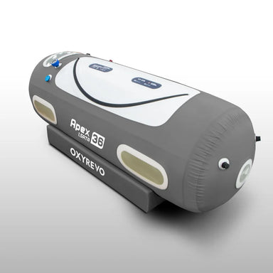 Angled studio view of the inflated OxyRevo Apex36 1.5ATA Chamber showing curved zipper, windows and base