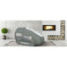 Wide banner of the 1.4 ATA Oxyrevo Forward90 Oxygen Chamber set up on a mat beside a lit fireplace
