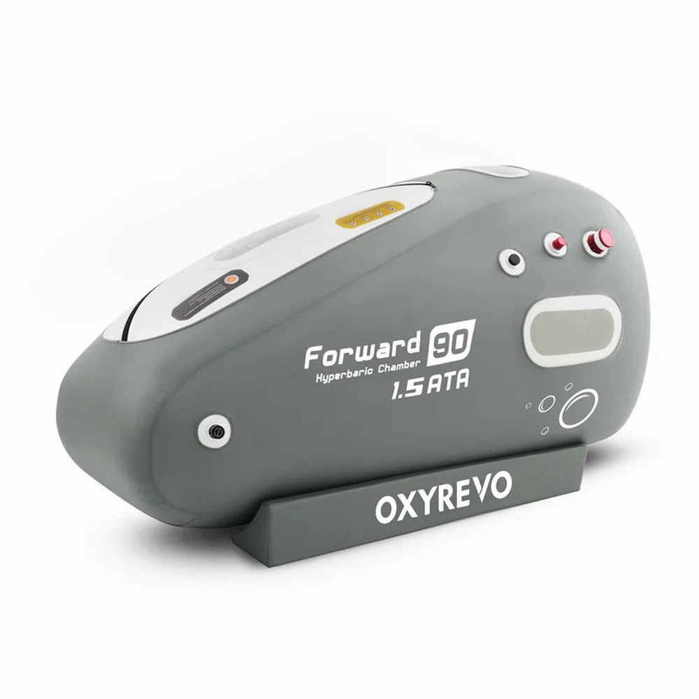 Rear angled view of the Oxyrevo Forward90 Oxygen Chamber showing red emergency valve and control labels