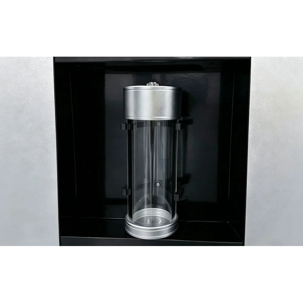 Clear water collecting bottle in its bay on the optional all-in-one machine for the OxyRevo Quest30 Oxygen Chamber