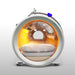 Looking into the OxyRevo Quest36 through its clear end window at the pillows, mattress and far porthole