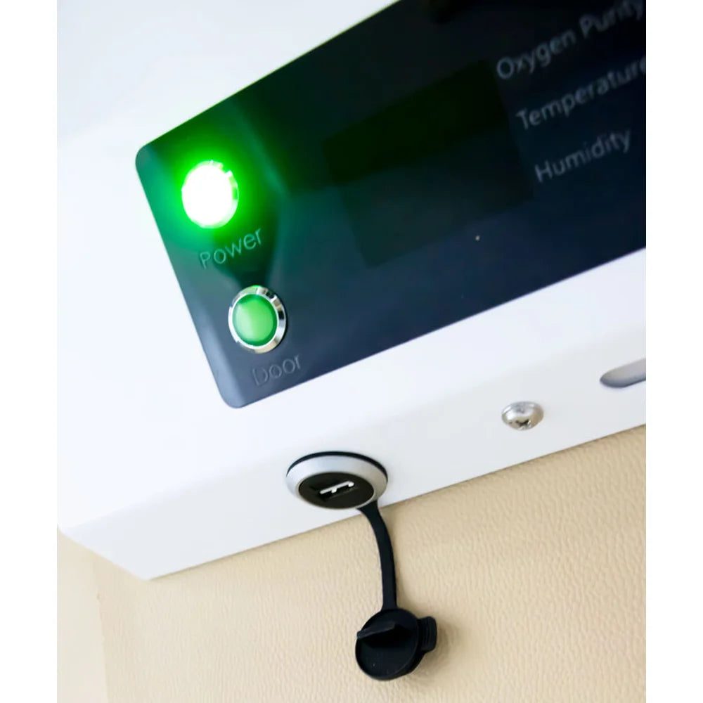 USB charging port and green power and door lights inside the OxyRevo Quest36 chamber wall