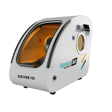 Angled front view of the white hard shell OxyRevo Space60 Oxygen Therapy Chamber with tinted door window