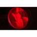 Round window view of quilted leather seating lit by red light inside the OxyRevo Space60 Hyperbaric Chamber