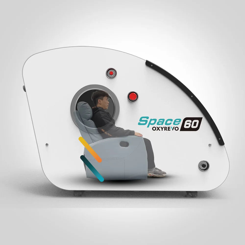 Cutaway view of a user seated upright inside the OxyRevo Space60 Oxygen Therapy Chamber