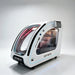 Angled white OXYREVO Space60 Pro Oxygen Chamber showing both large windows and red interior LED strip