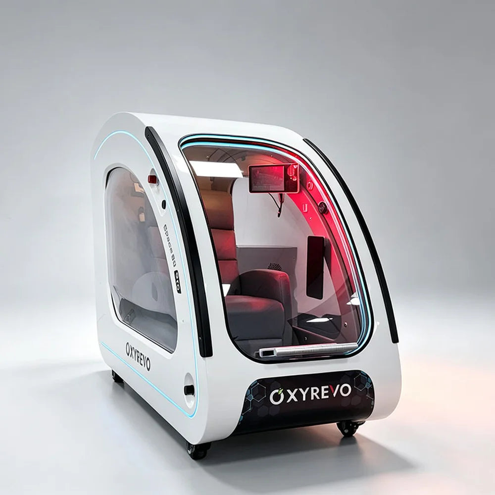 Front-side angle of the white OXYREVO Space60 Pro Oxygen Chamber with lit trim and internal control panel