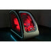 Silver OXYREVO Space60 Pro photographed in a dark room with cyan trim and deep red cabin illumination