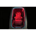 Front-on look through the doorway of the OXYREVO Space60 Pro at the recliner under red therapy light