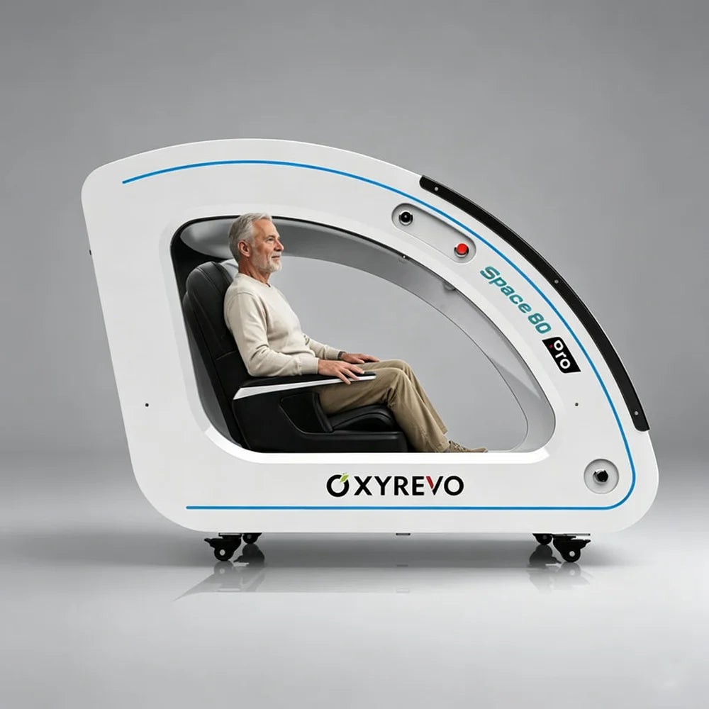 Man seated upright inside the white OXYREVO Space60 Pro Hyperbaric Chamber in sitting mode with feet down