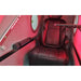 Bluetooth speaker bar mounted on the side rail inside the red-lit OXYREVO Space60 Pro cabin next to the seat