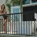 Primal Plunges Blizzard cold plunge on a balcony with yoga blocks