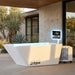 Primal Plunges Whiteout cold plunge with touchscreen on outdoor patio
