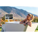 Woman relaxing in the Primal Plunges Whiteout angled cold plunge
