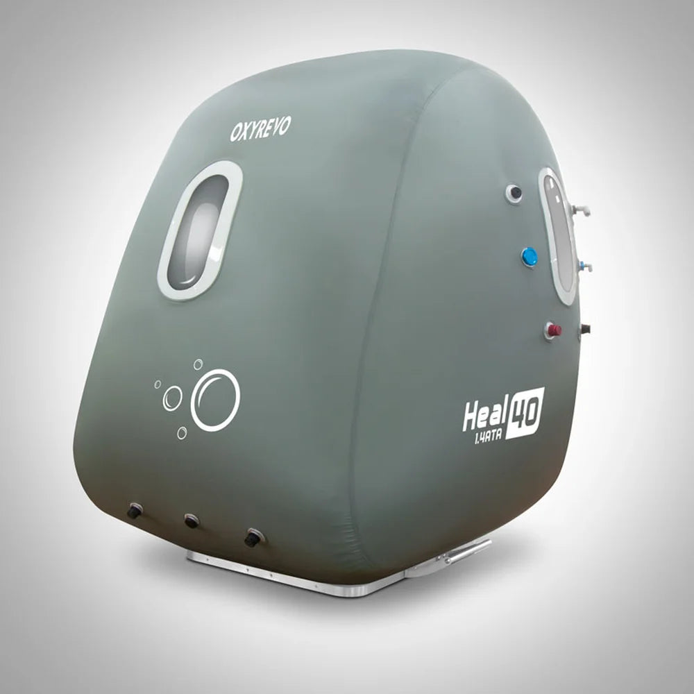 Back corner view of the Oxyrevo Heal 40 with its rear window, coloured valve connectors and base fittings
