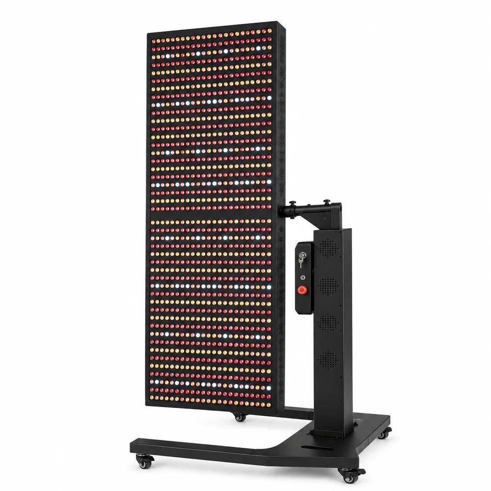 Angled view of the black RevitalCore Apex Red Light Panel upright on its wheeled floor stand with the full LED array lit