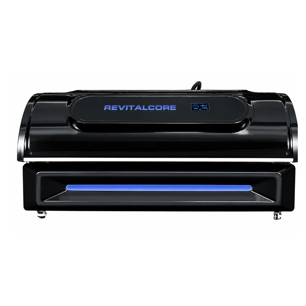 Closed RevitalCore Apex M6 seen head-on with blue wordmark, digital control display and illuminated base strip