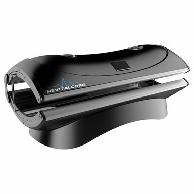 Three-quarter angled view of the RevitalCore Ascend M4 Therapy Bed showing logo, cooling vents and touchscreen