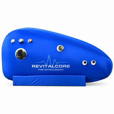 Blue TPU soft-shell RevitalCore Ascent Rise Hyperbaric Chamber shown in side profile with round windows, gauge and hose ports