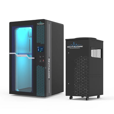 Angled view of the RevitalCore Cryo Elite Whole Body Cryotherapy Chamber with lit glass cabin and separate refrigeration unit