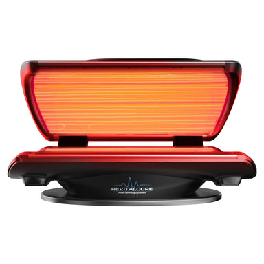 Open canopy of the RevitalCore Elevate M7 Light Therapy Bed with both acrylic panels glowing bright red