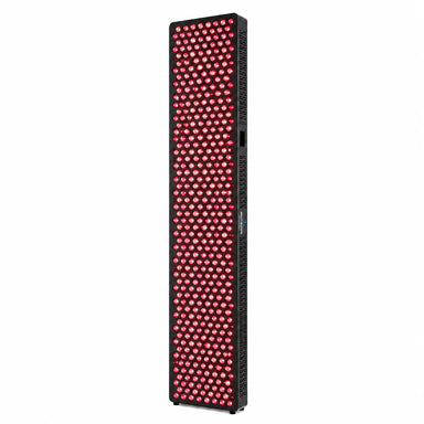 Illuminated front face of the RevitalCore X-Ascend Red Light Panel in black with hundreds of glowing LEDs