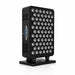Angled studio shot of the powered-off RevitalCore X-Aura Pro Red Light Therapy unit on its weighted tabletop base