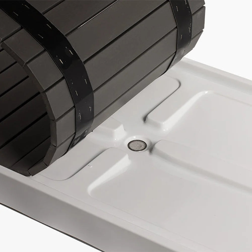 Rolled-up composite slats and centre drain channel detail on the Revive Acrylic Cold Plunge Basin tray floor