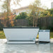 Covered Revive Plunge Acrylic Plunge Tub with step and chiller set up on a backyard tile patio