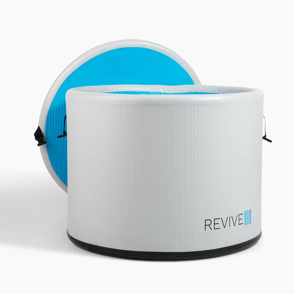 Revive Inflatable Pod Plunge Cold Plunge Tub open with the blue underside of the lid visible behind it
