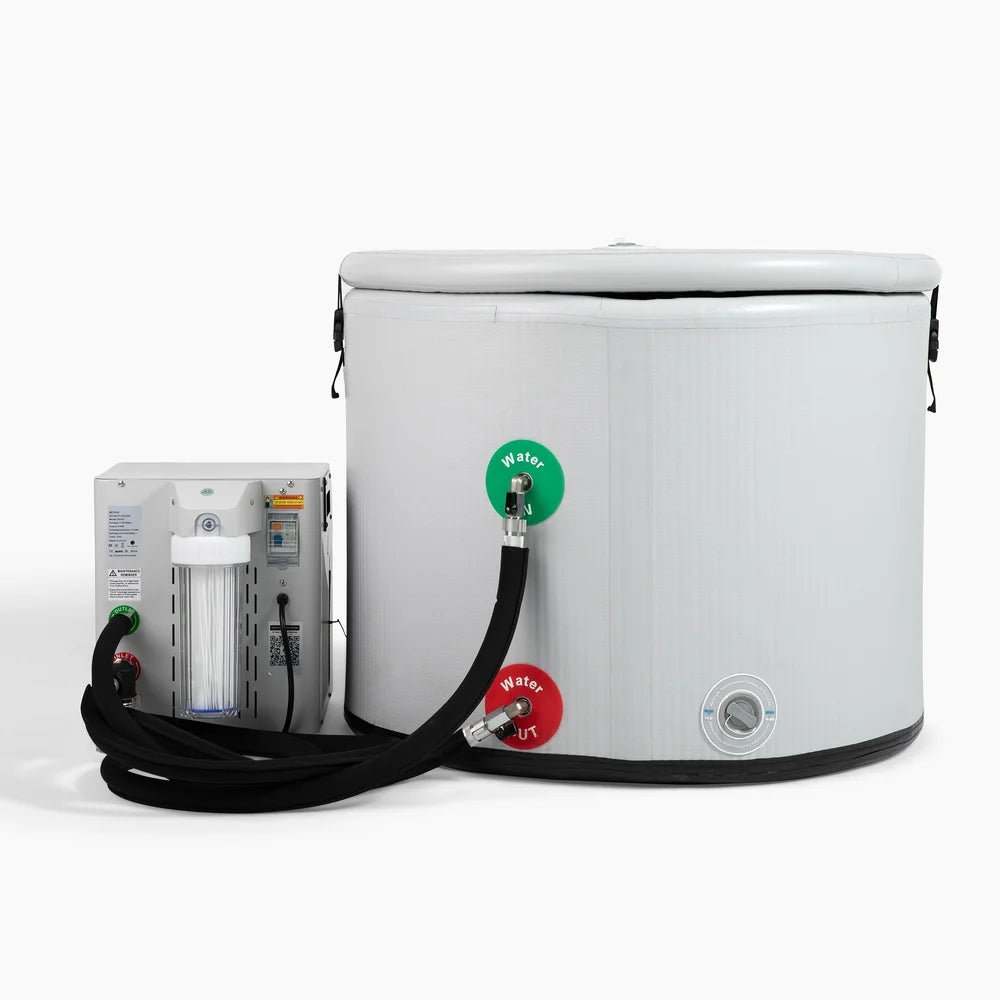 Quick connect hoses linking the chiller to the water in and out ports of the Revive Inflatable Pod Plunge Recovery Tub