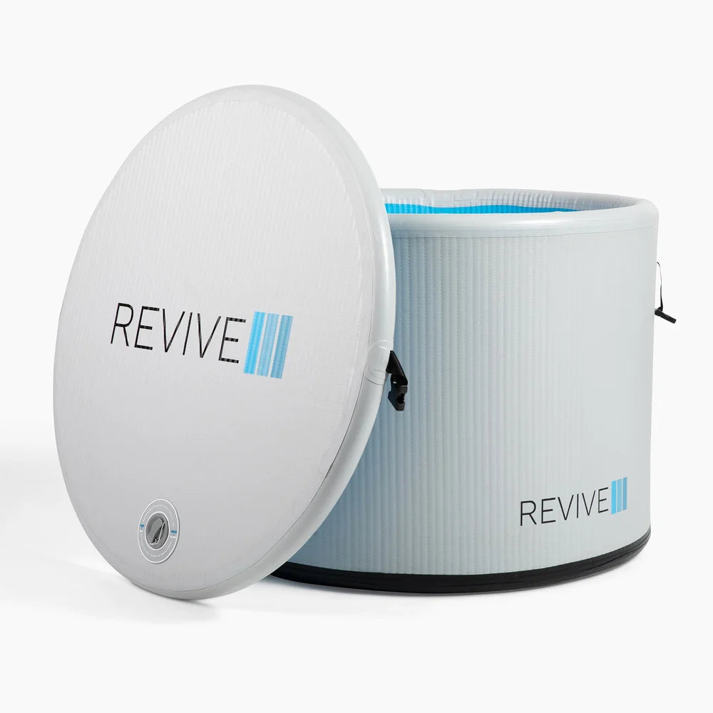 Open Revive Inflatable Pod Plunge Cold Plunge with its round inflatable lid propped against the tub wall